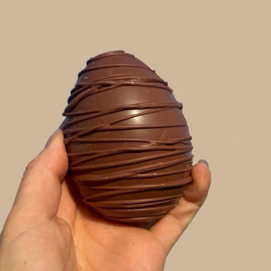 BELGIAN CHOCOLATE FILLED HALF EGGS 120G